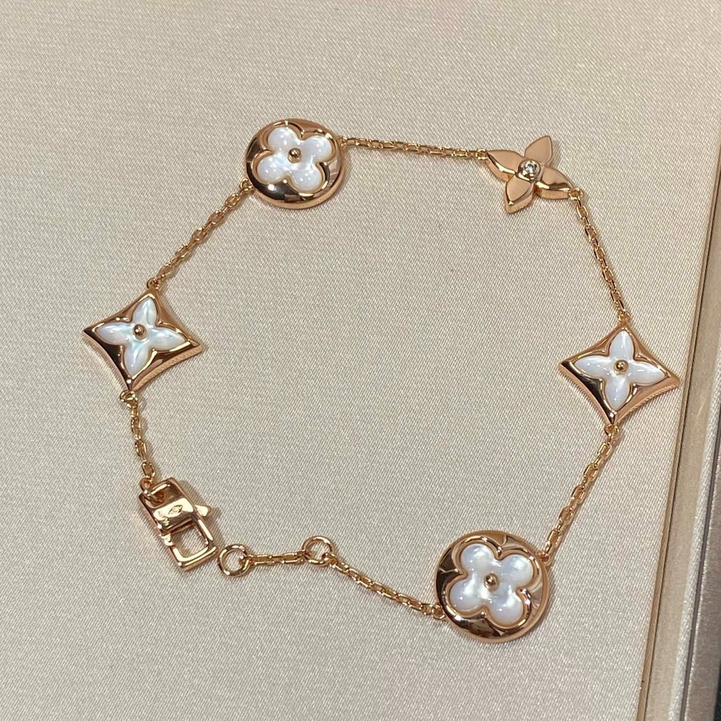 [Bloom]STAR AND SUN 5 MOTIF MOP PINK GOLD BRACELET